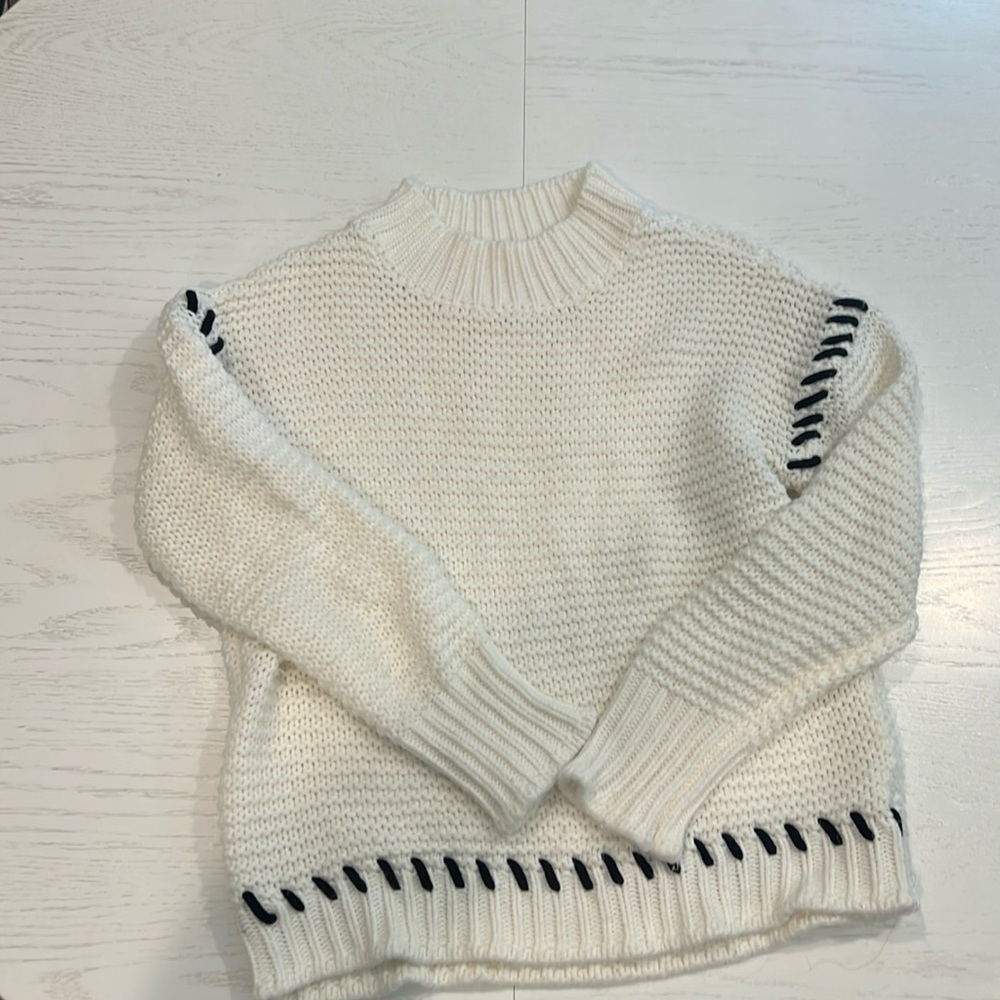 Warm cream  sweater with black accents size M